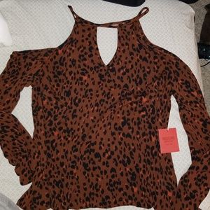 Flirty cold shoulder leporad blouse